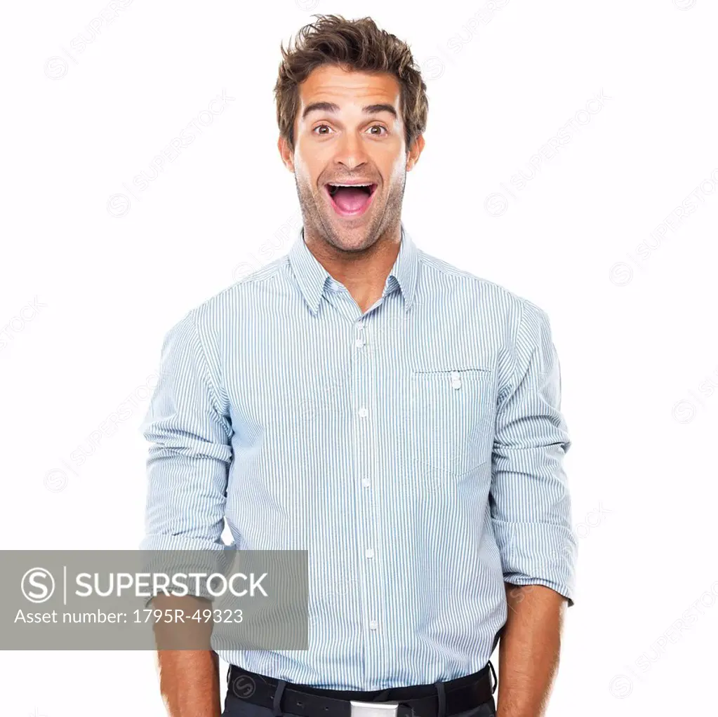 Portrait of cheerful business man with wide grin standing