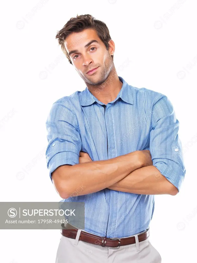 Studio portrait of smart young business man smiling