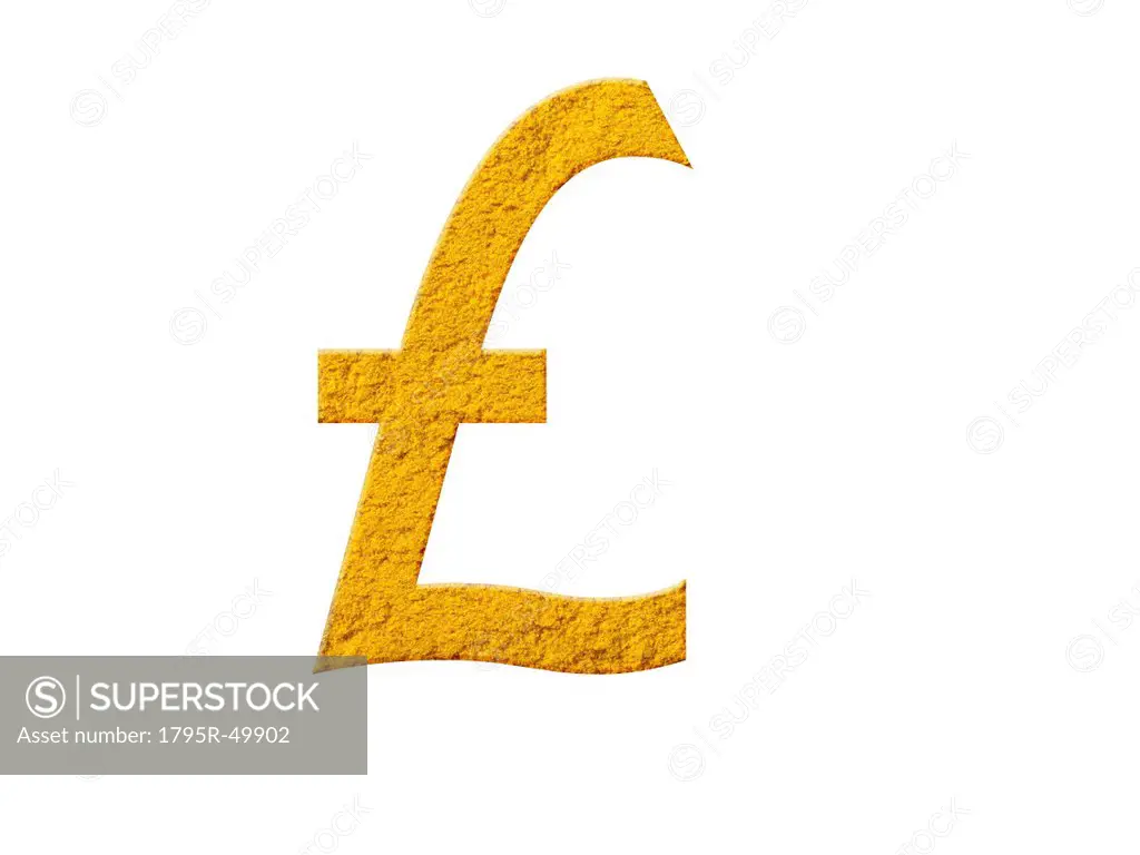 Studio shot of Mustard Powder making British Pound Sign on white background