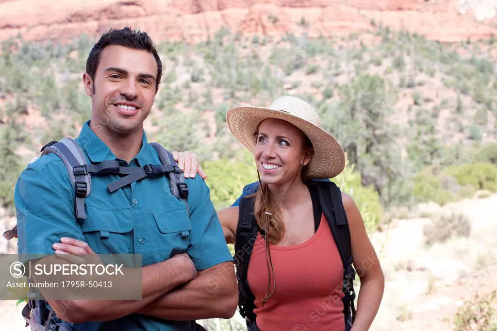 USA, Arizona, Sedona, Young couple hiking, man holding map