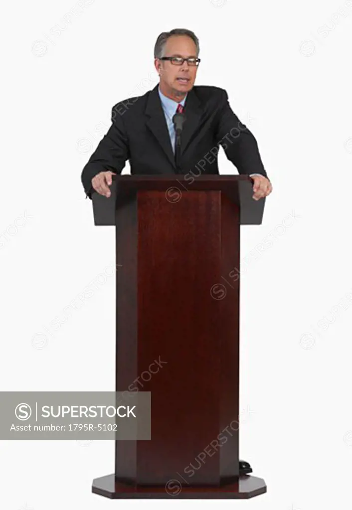Businessman speaking at podium