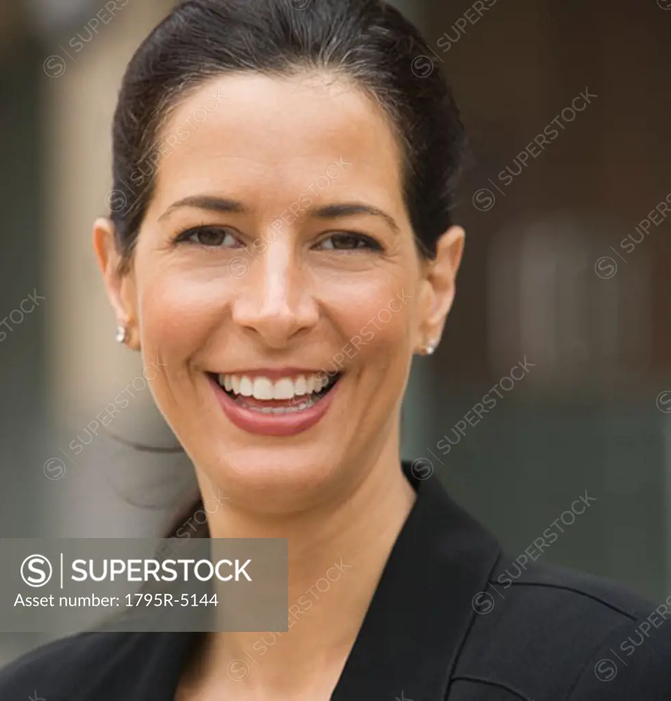 Close-up of woman smiling outdoors