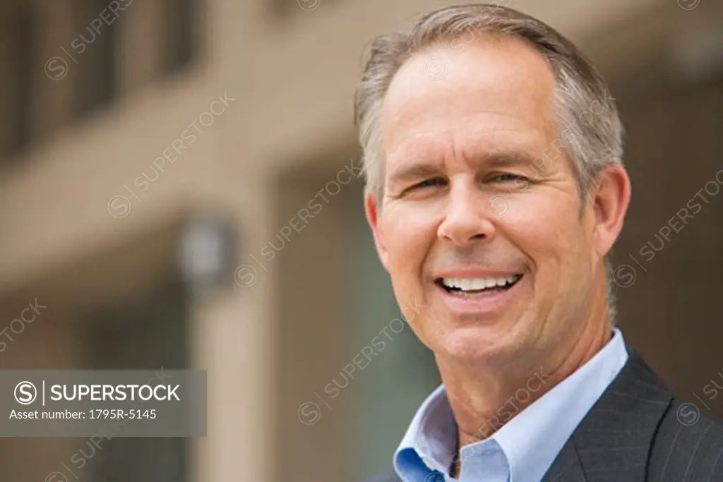 Close-up of man smiling outdoors