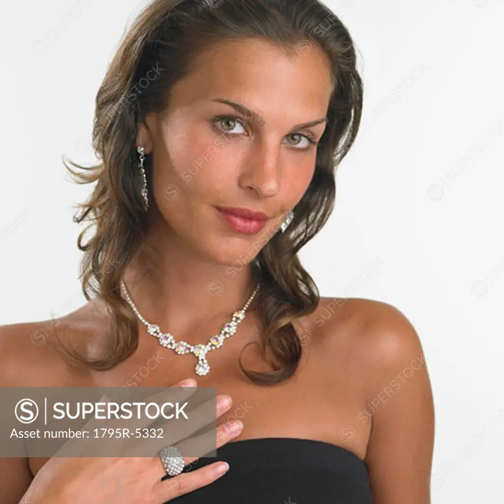 Studio shot of woman wearing fancy jewelry
