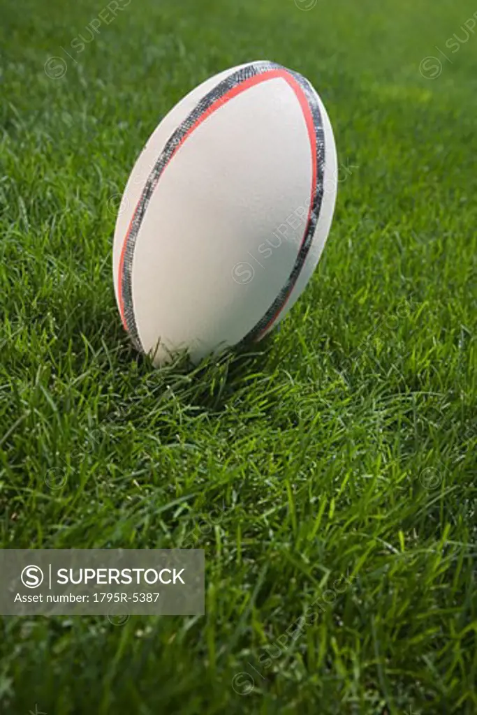 Close-up of football on grass
