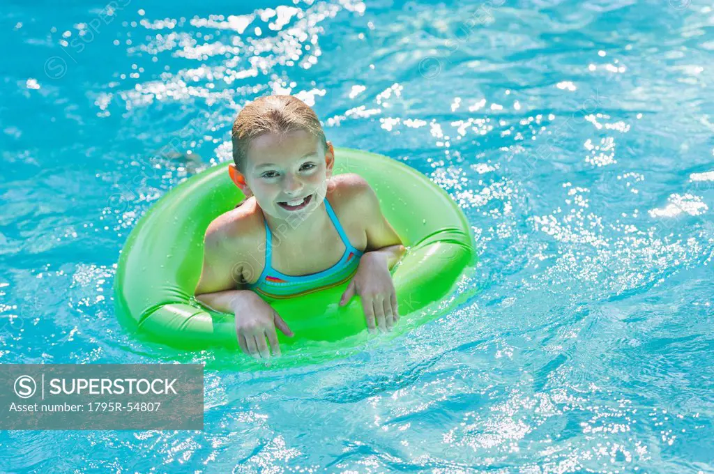 Portrait of girl 10_11 in swimming pool