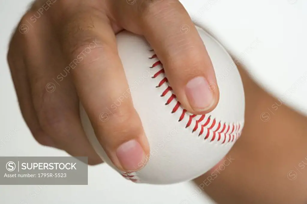 Close-up of pitcher holding baseball