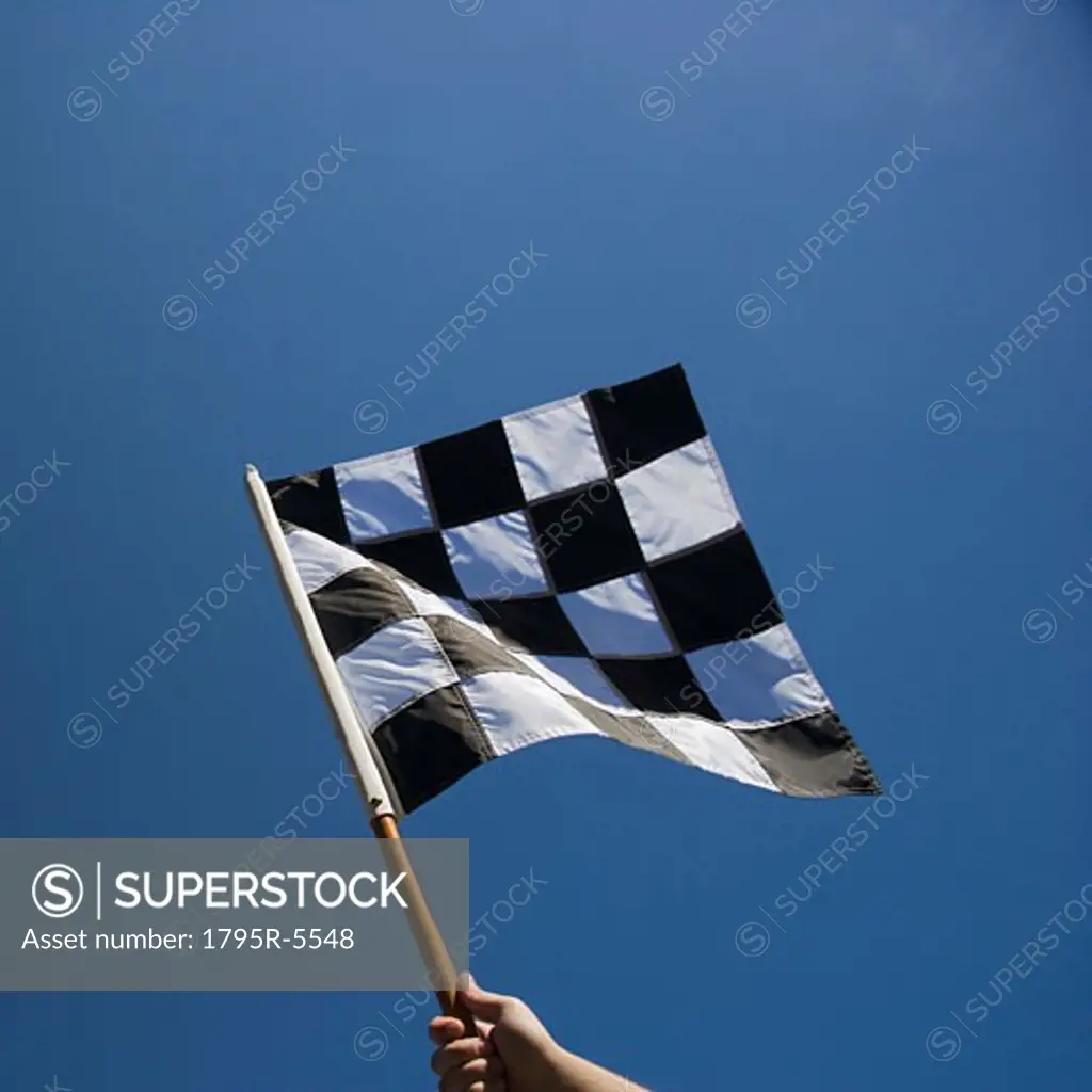 Checkered flag with blue sky