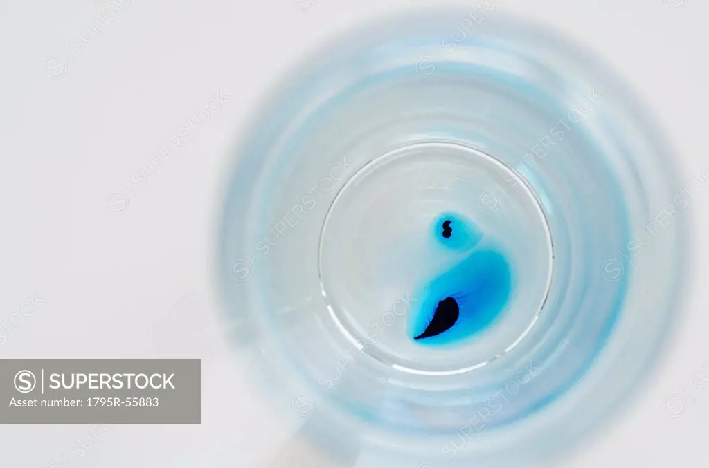 Studio shot of laboratory beaker with blue liquid