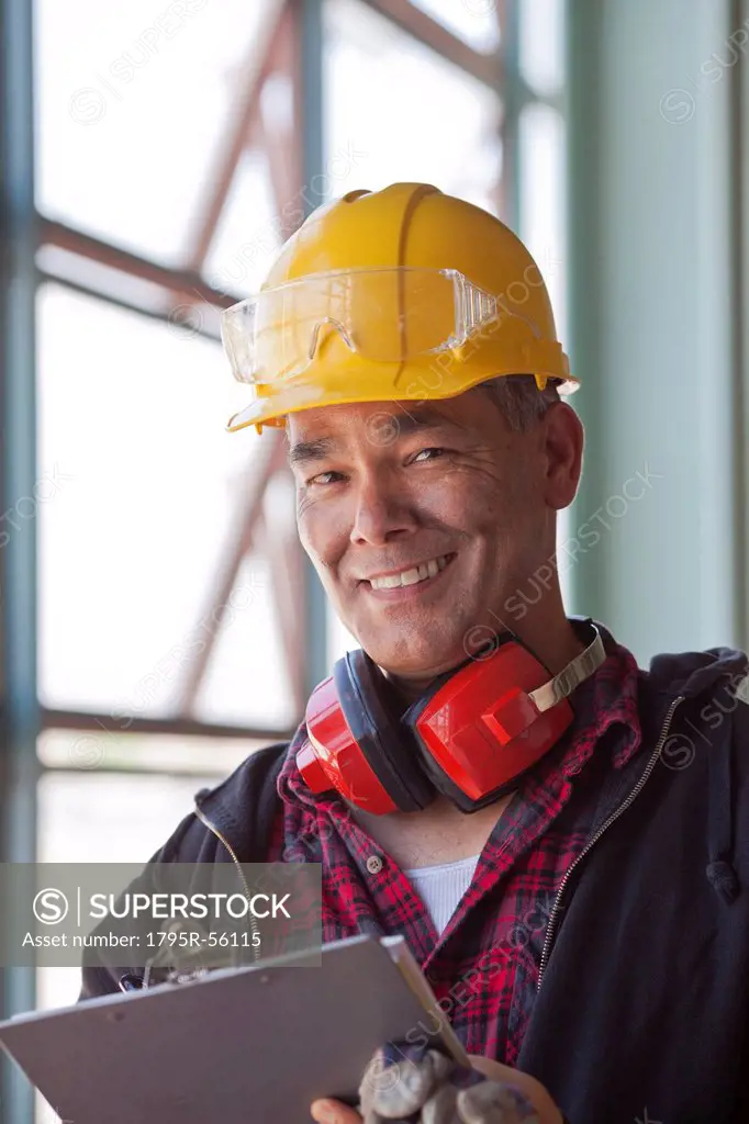 Portrait of male manual worker wearing hardhat