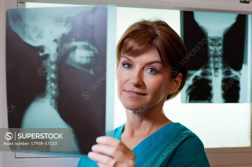 Portrait of female doctor looking at x_ray