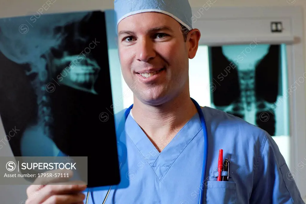 Portrait of male doctor looking at x_ray