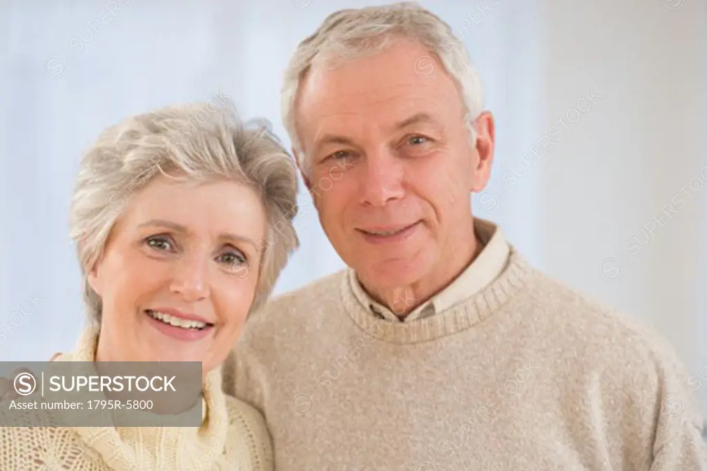 Close-up of senior couple smiling
