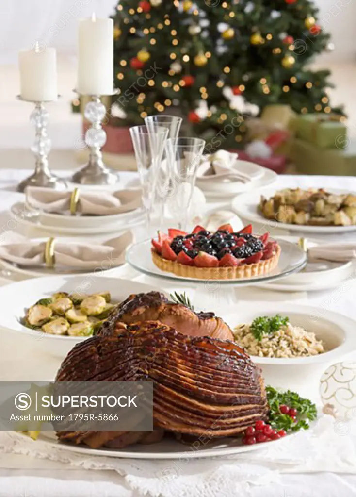 Spiral ham and side dishes on Christmas table
