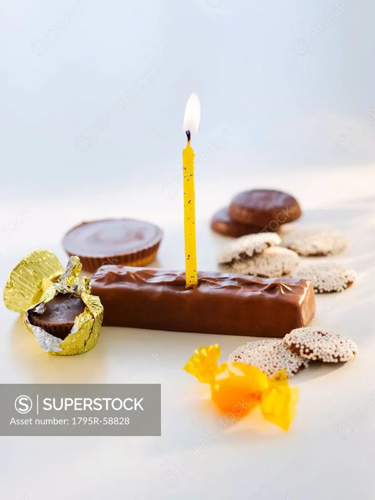 Studio shot of chocolate bars with birthday candle