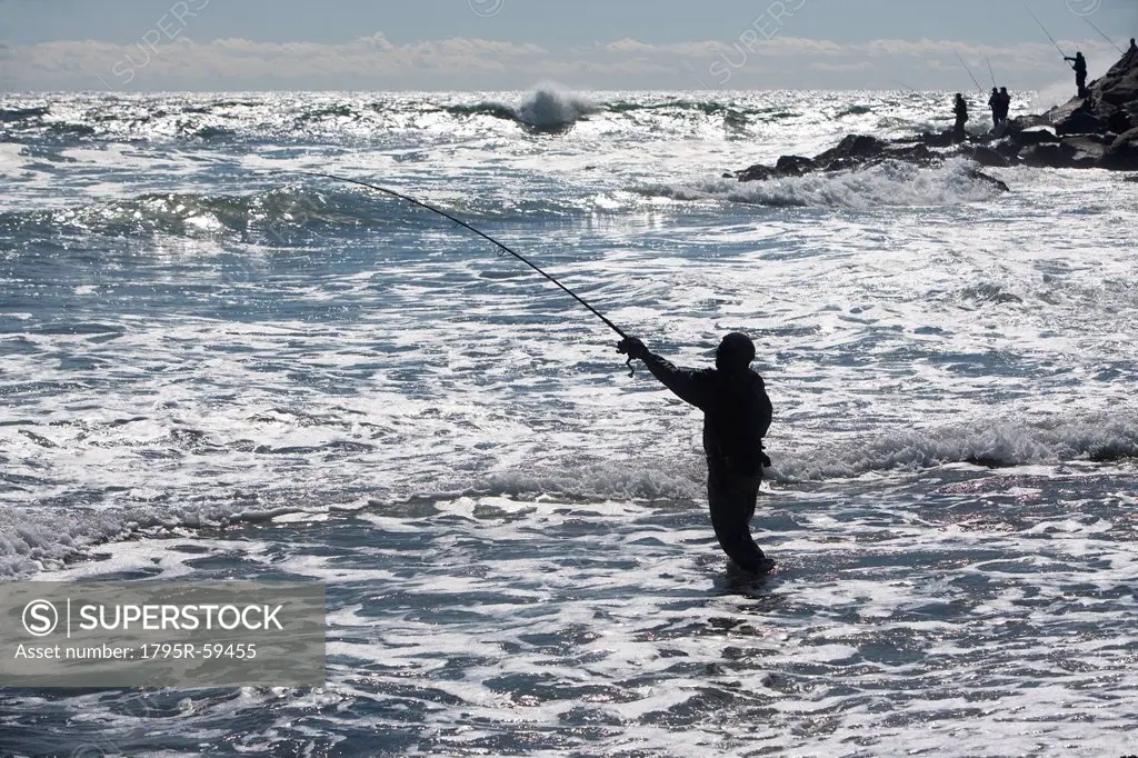 USA, New York, Long Island, Montaurk, Man fishing in sea