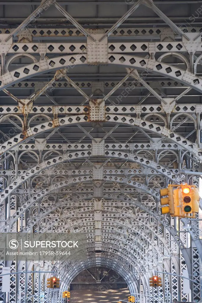 USA, New York City, Traffic lights under bridge