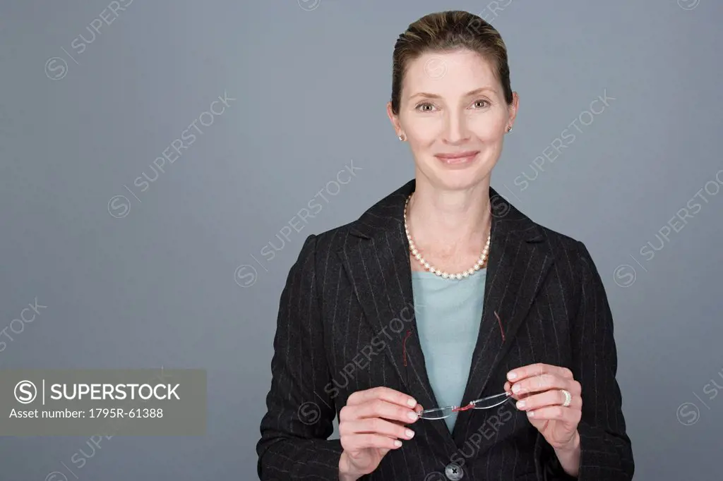 Portrait of cheerful mature businesswoman