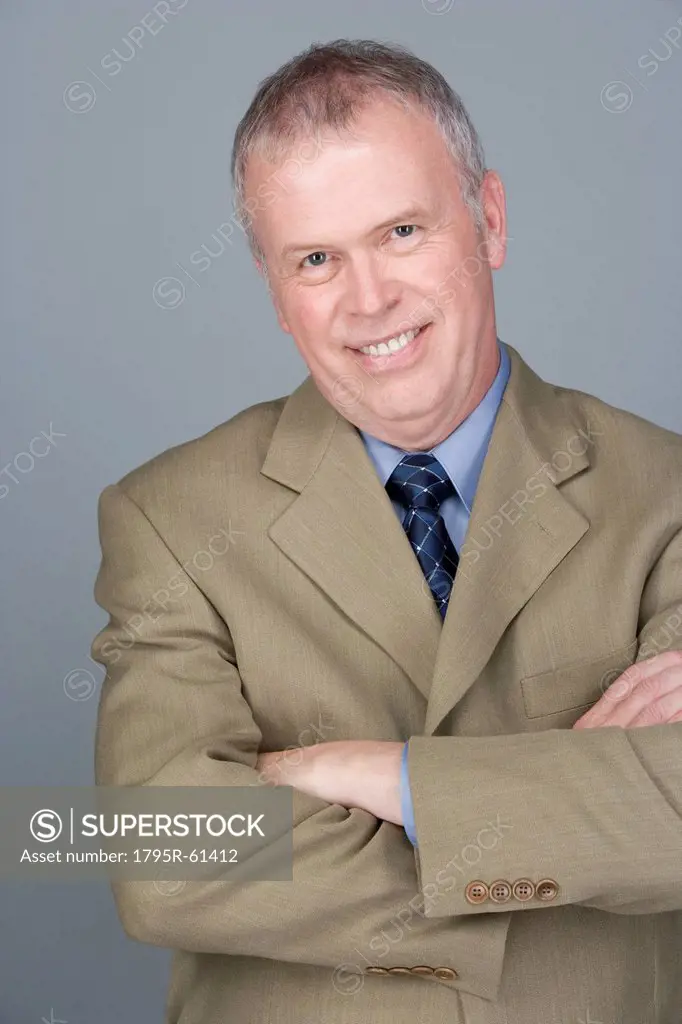 Portrait of happy mature businessman