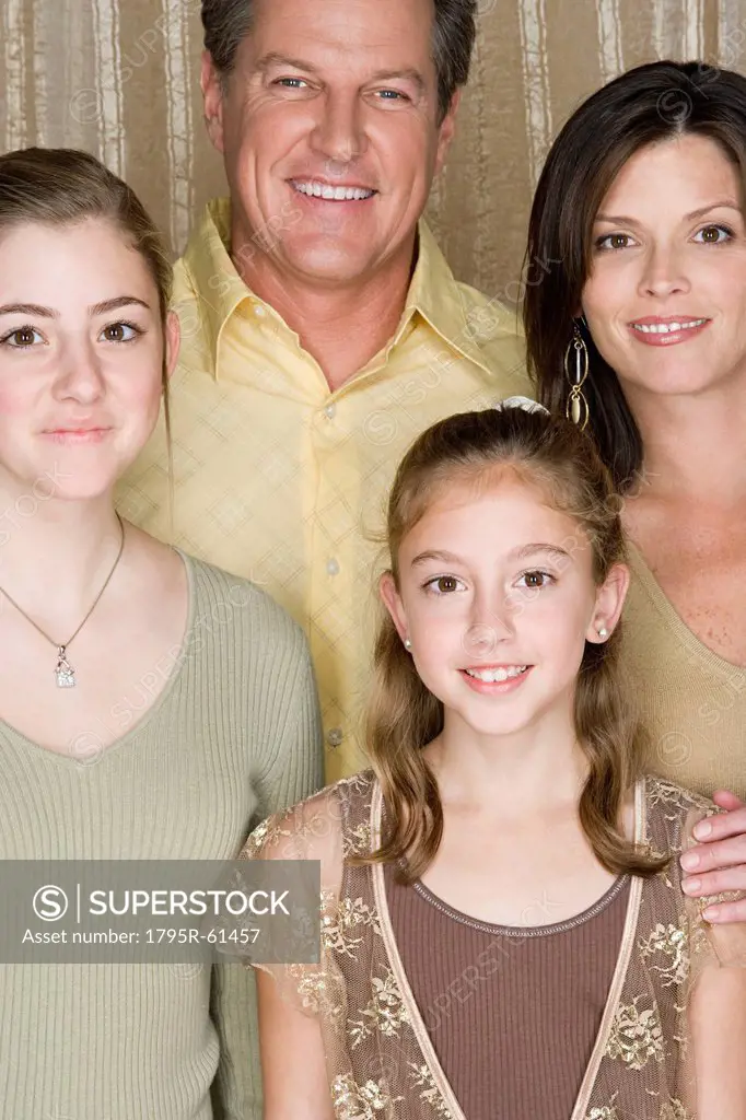 Portrait of three generation family with two girls 8_9, 14_15