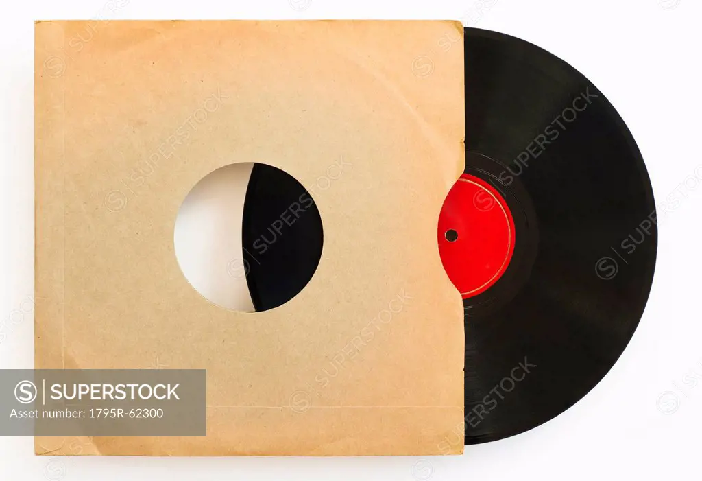 Vinyl record in envelope on white background, studio shot