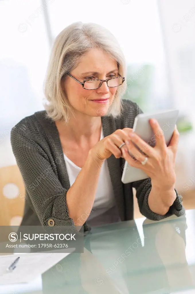 Senior woman working from home