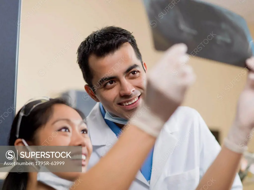 Dentists checking x_ray image