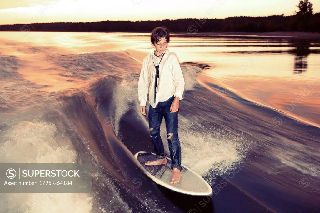 Boy wakeboarding on Lake Greeson