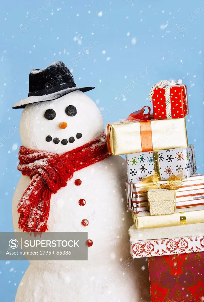 Studio shot of snowman with Christmas presents