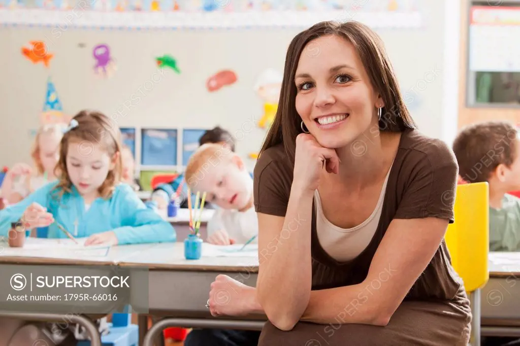Teacher with children 4_5, 6_7 during art classes