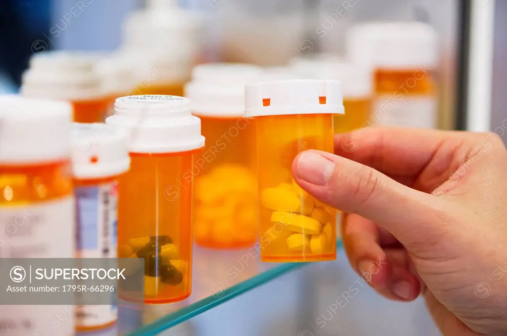Pill bottles on shelf