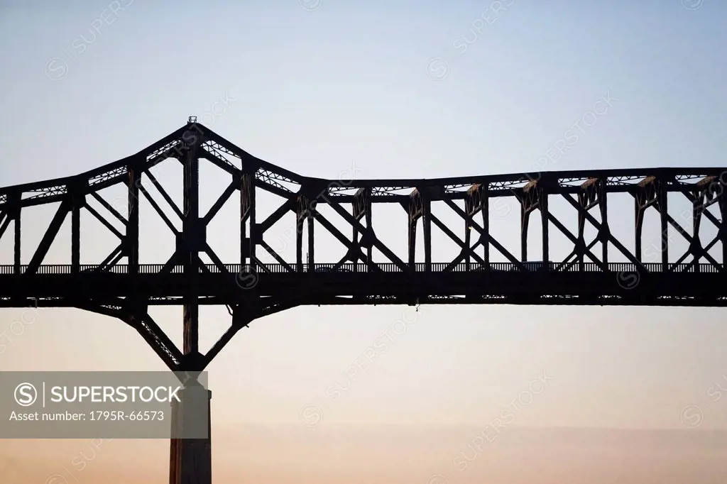 Silhouette of steel bridge