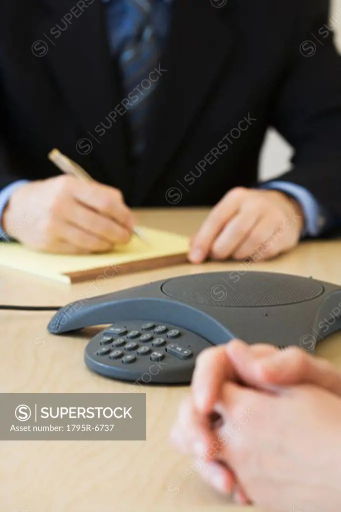 Businesspeople having teleconference