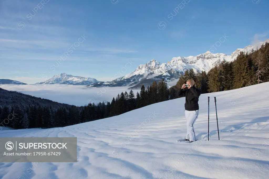 Young woman hiking in winter scenery