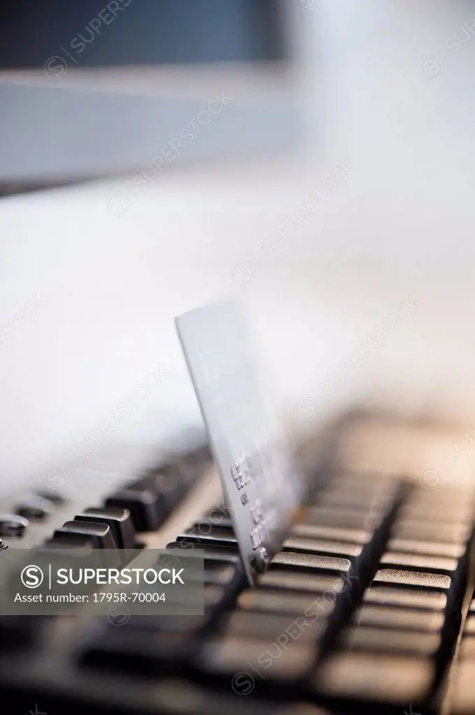 Close_up shot of computer keyboard and credit card