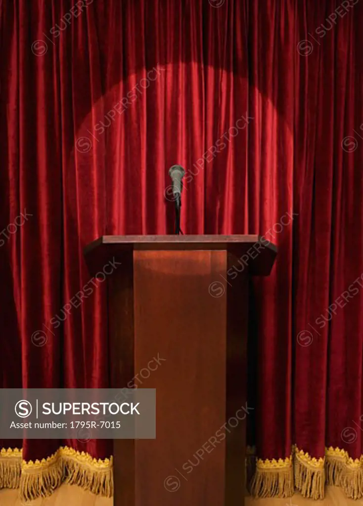 Spotlight on podium on stage
