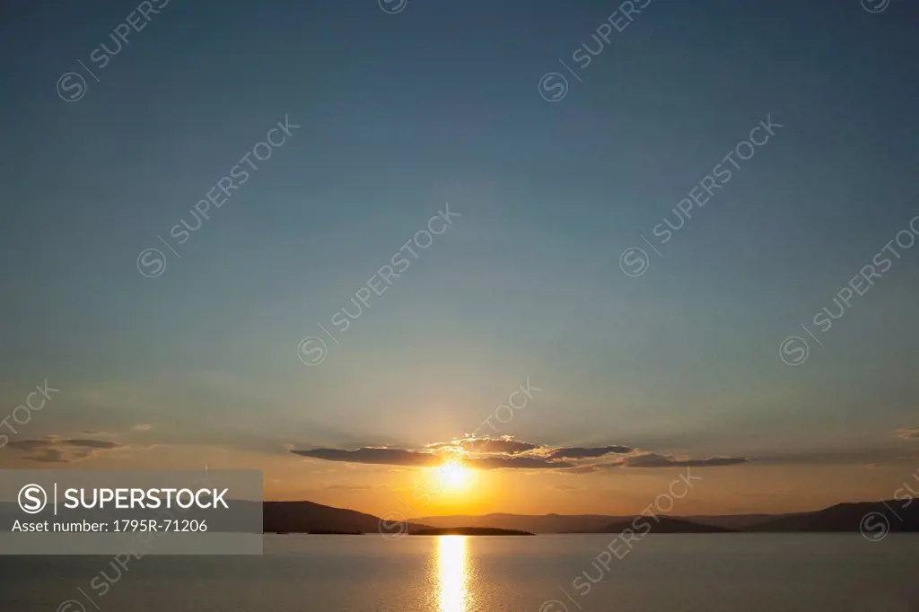 USA, Montana, Flathead Lake, View of sunset over lake