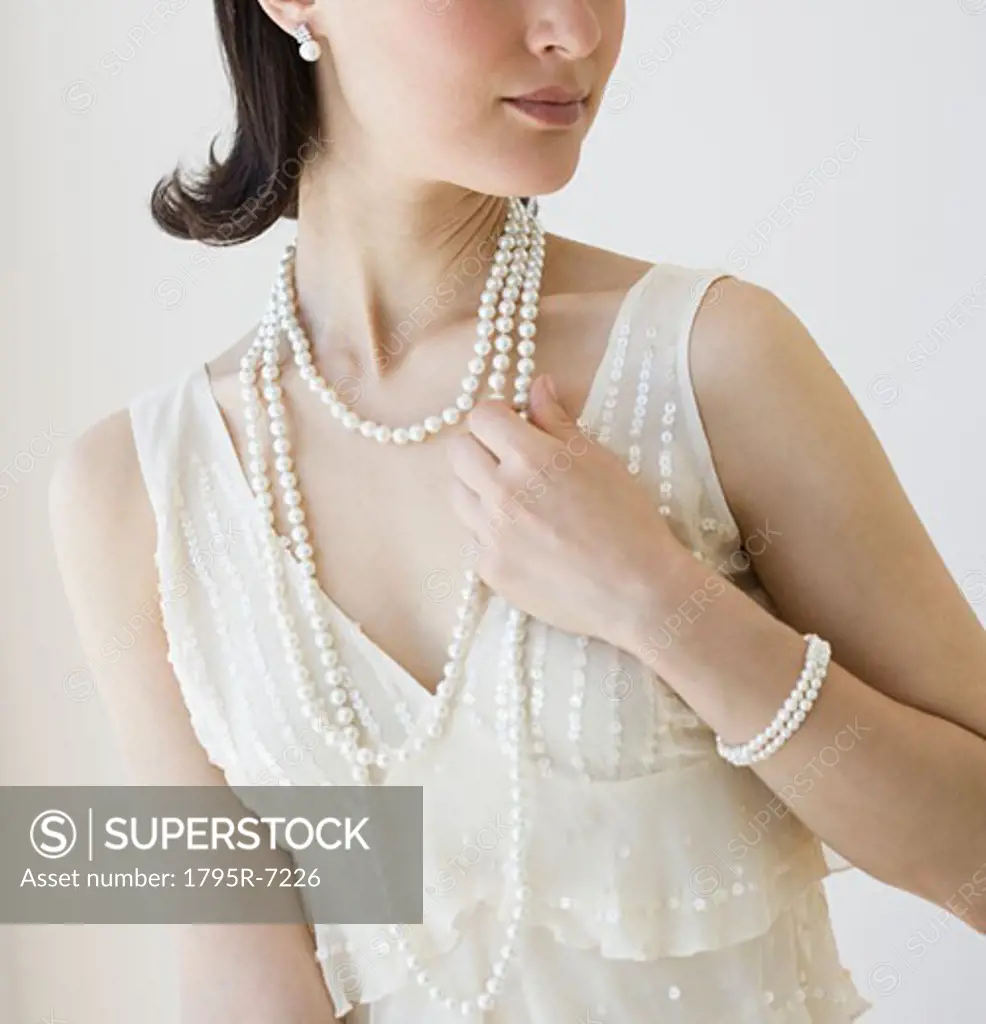 Woman wearing pearl jewelry