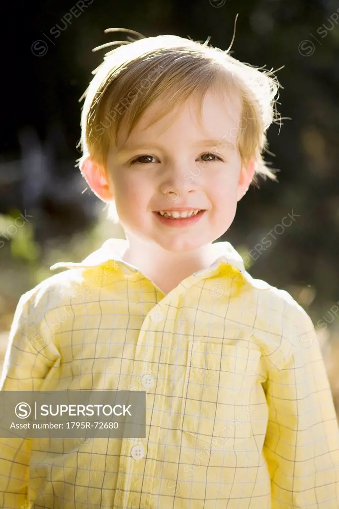 Outdoor portrait of happy young boy 6_7