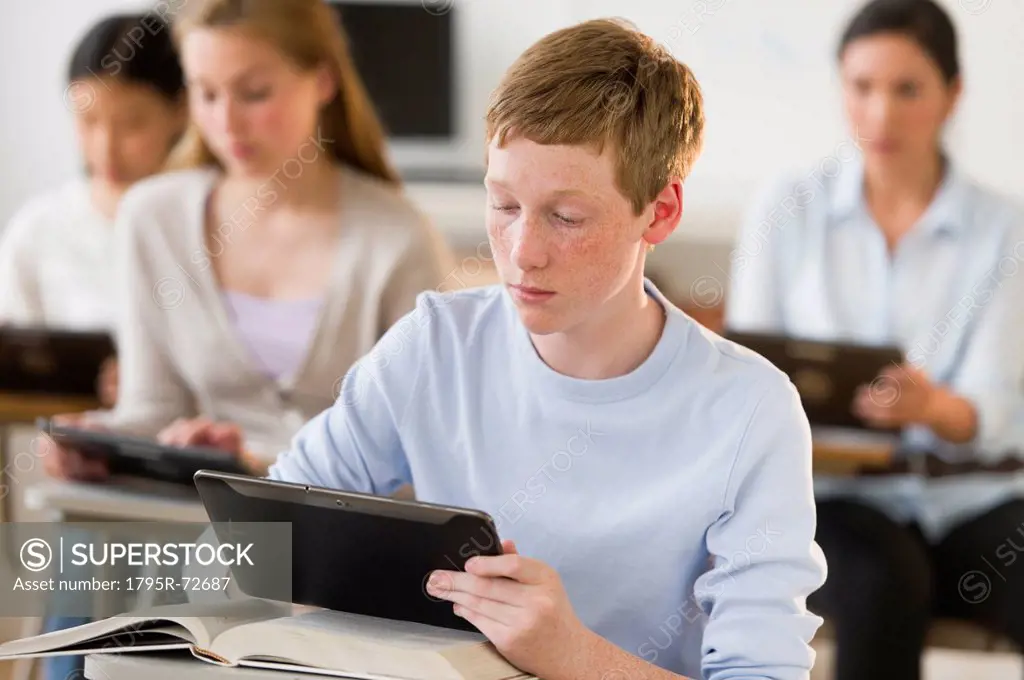 Students 14_19 using digital tablets at school