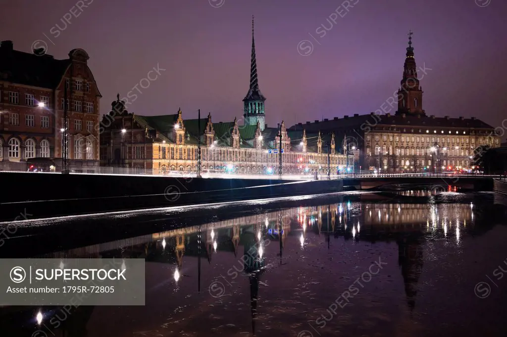 View over canal towards Copenhagen Stock Exchange and Christiansborg Castle