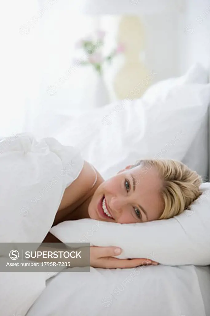 Woman laying in bed