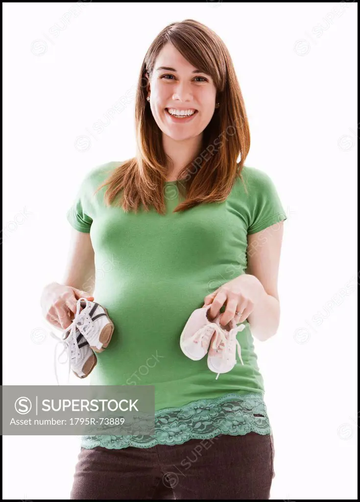 Portrait of pregnant woman, studio shot