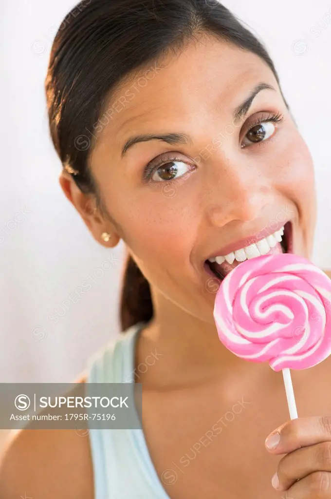 Woman eating lollypop