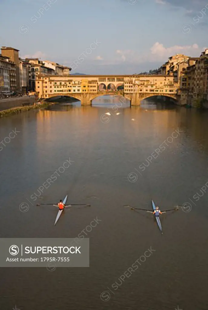 High angle view of people sculling, Ponte Vecchio, Florence, Italy
