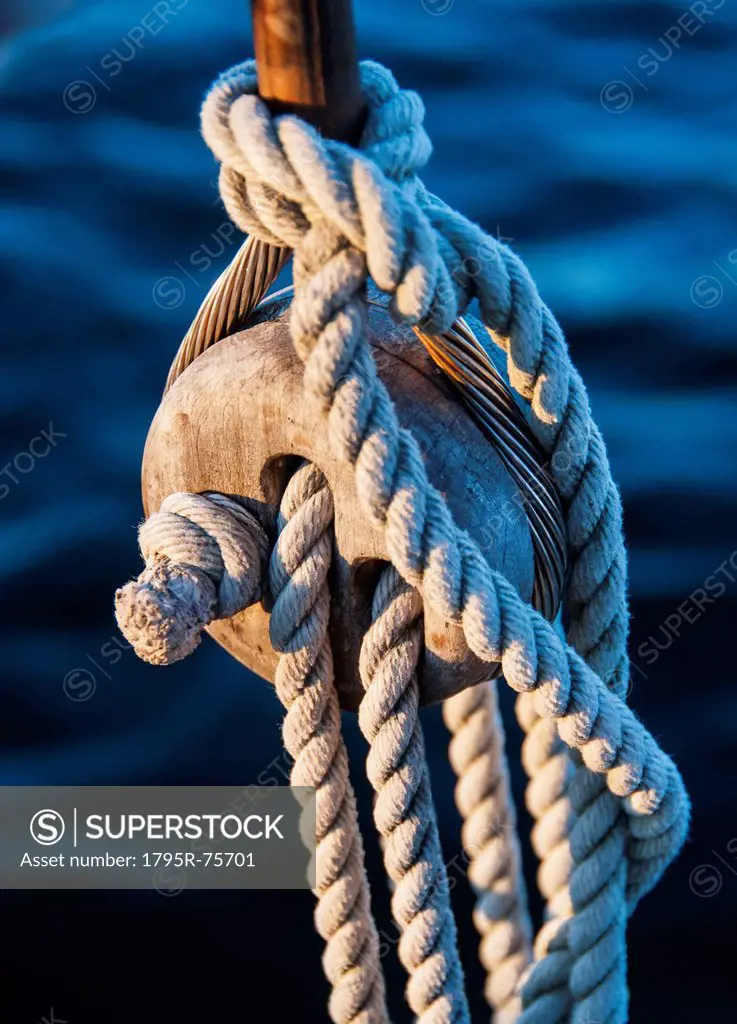Close_up view of yacht ropes against rippled water