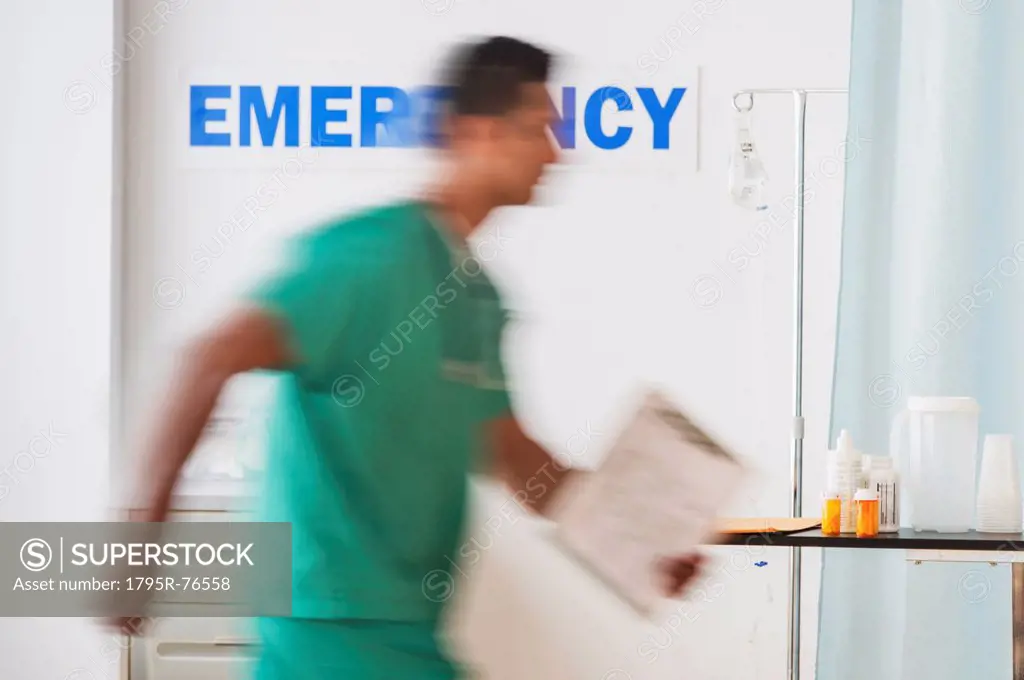 Surgeon entering emergency room