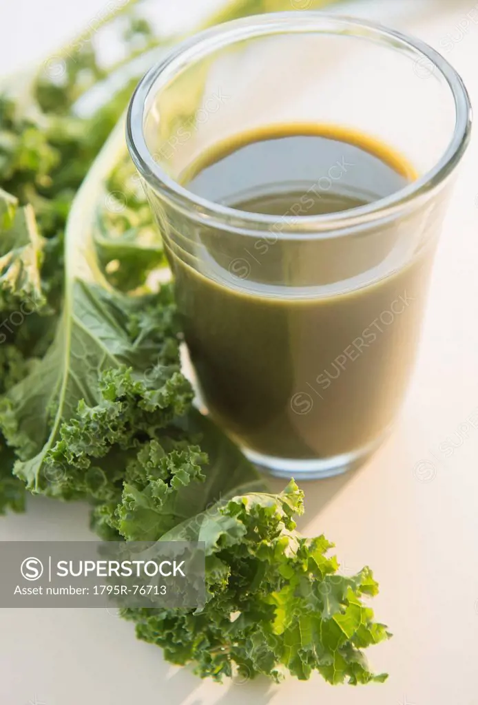 Studio shot of kale and green smoothie