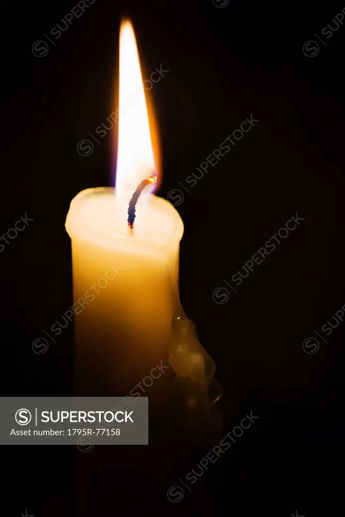 Studio shot of burning candle