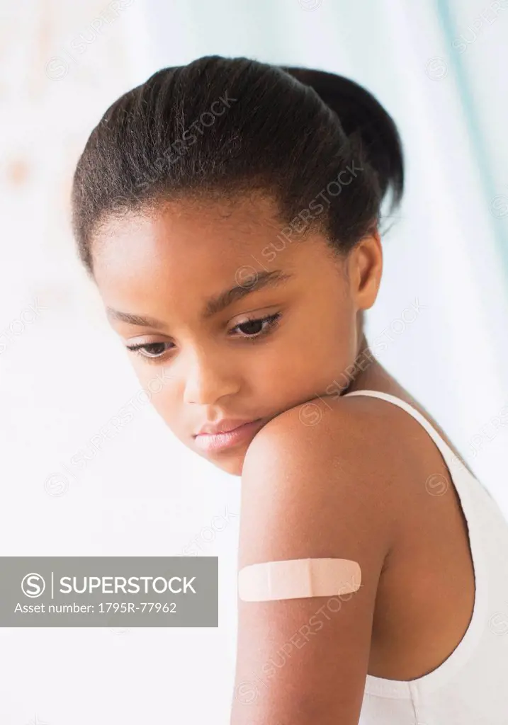 Girl 6_7 with band_aid on arm